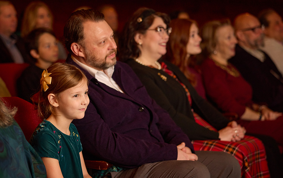 A father and daughter enjoying a show in the Auditorium Theatre