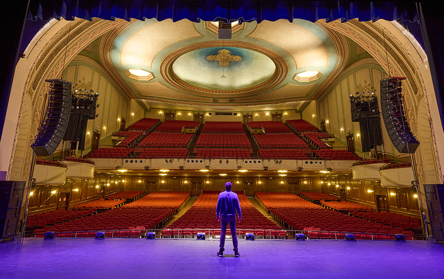 A performer on the stage in the Auditorium Theatre